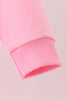 Pink football sequin mom&me top
