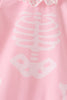 Pink skeleton print ruffle romper