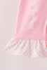 Pink skeleton print ruffle romper