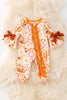Multi Western printed baby bodysuit with bell sleeves.