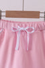 Pink scallop hem bow skort