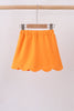 Orange scallop hem bow skort