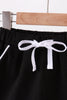 Black scallop hem bow skort