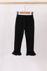 Black ruffle pants