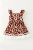 Brown Cow Printed Dress with lace hem and front bow