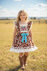 Brown Cow Printed Dress with lace hem and front bow