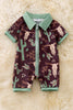 BULL SKULL & CACTUS PRINTED ON BROWN BABY ROMPER WITH GREEN TRIM.
