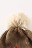 Brown pompom mushroom cable beanie