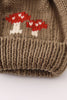 Brown pompom mushroom cable beanie