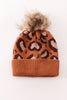 Brown pompom leopard cable beanie