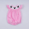 Pink character hand smocked dot ruffle bubble