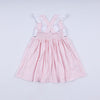 Pink character hand smocked gingham ruffle dress
