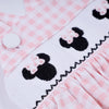 Pink character hand smocked gingham ruffle bubble
