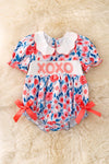 XOXOXO FLORAL PRINTED ROMPER WITH CUTE SCALPED NECKLINE.