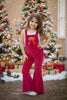 CHRISTMAS CHARACTER ON FUCHSIA VELVETY FABRIC ROMPER.