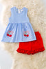 CHERRY POCKET TUNIC AND RED RUFFLE SHORTS.