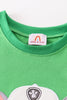 Green character applique boy top