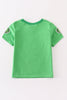 Green character applique boy top