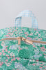 Green floral ruffle backpack
