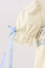 Cream smocked bubble