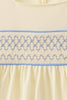 Cream smocked ruffle dress
