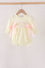 Cream smocked bow bubble