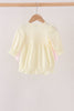 Cream smocked bow bubble